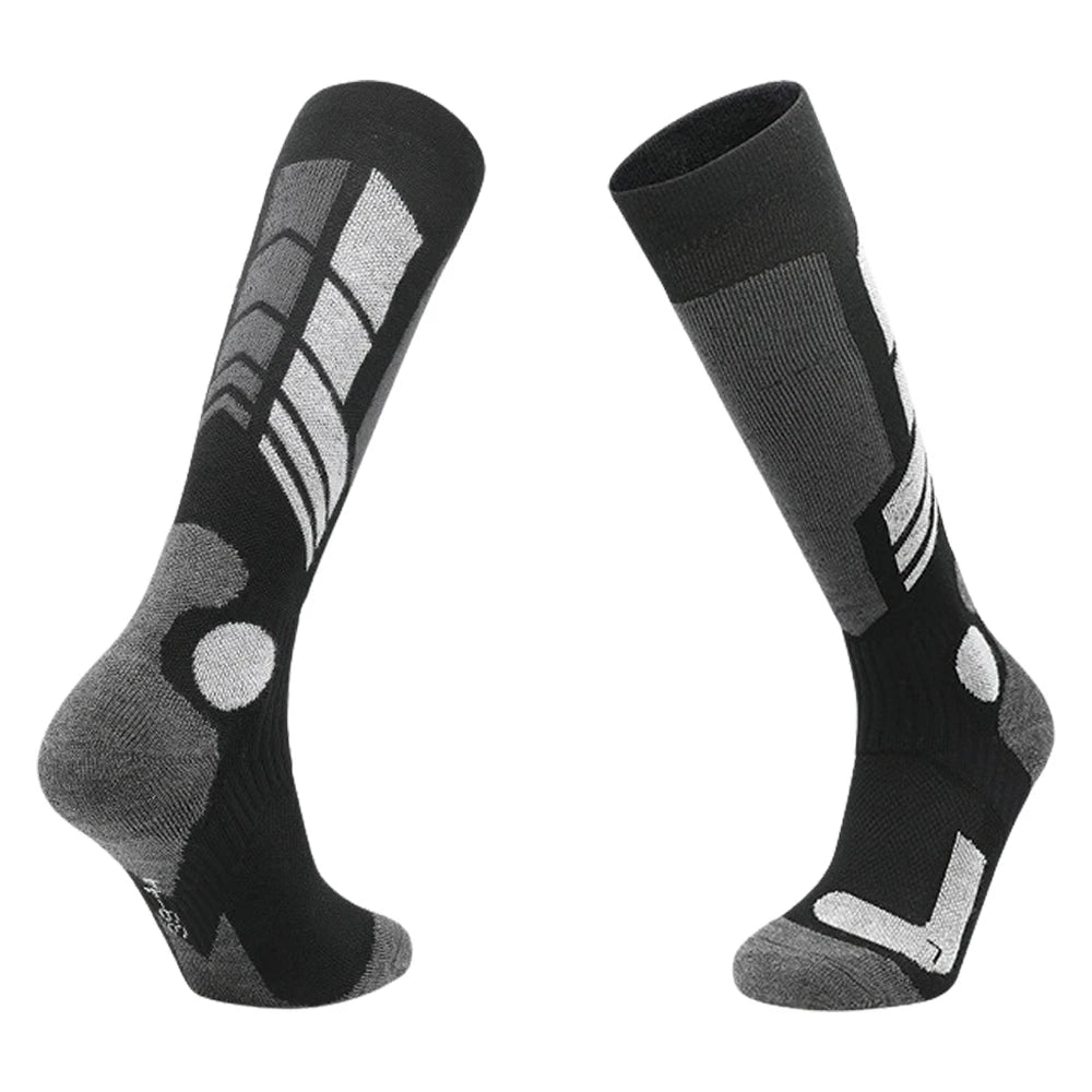 Black and white cushioned thermal ski socks on a white background