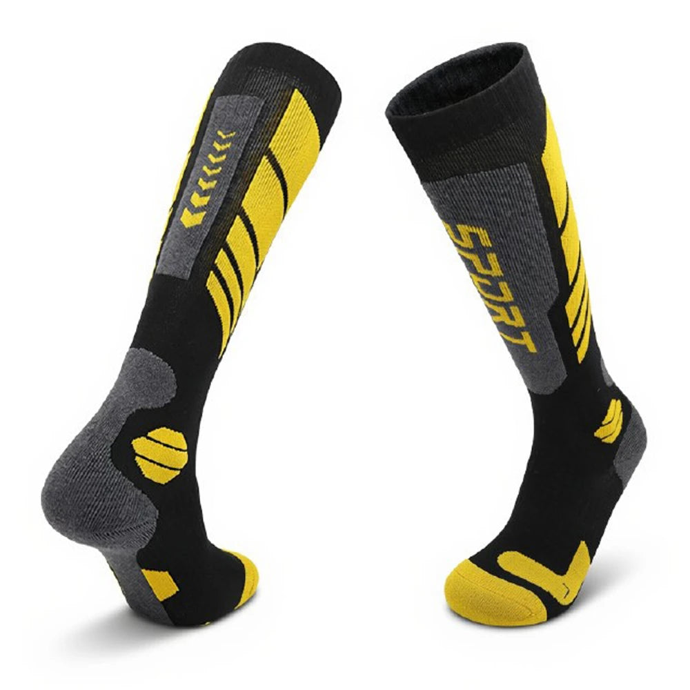Black and yellow cushioned thermal ski socks on a white background