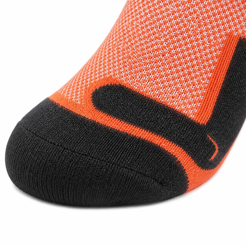 Close-up of the toe and knit construction on orange and black ski socks