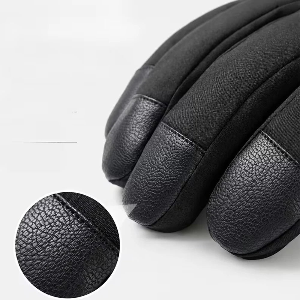 Close-up of reinforced fingertips on black ski gloves