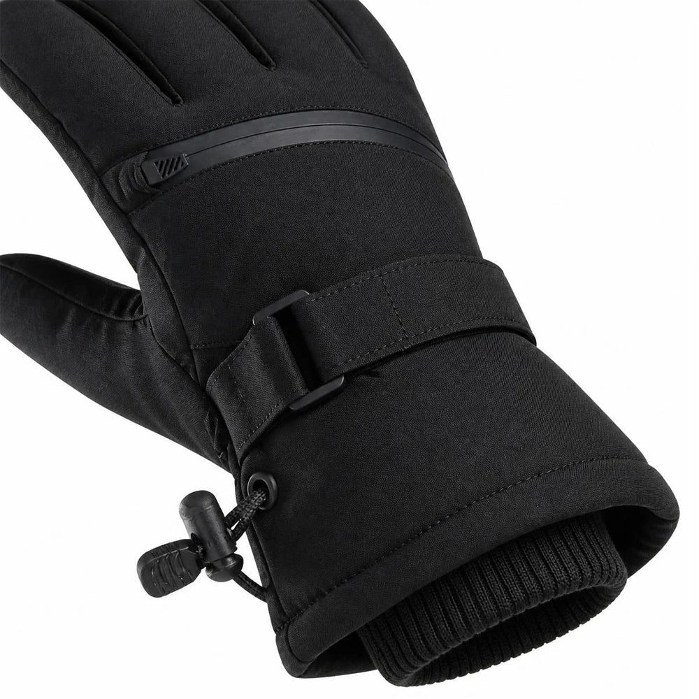 Close-up of the adjustable wrist strap, drawcord toggle, and ribbed knit cuff on the black ski gloves.