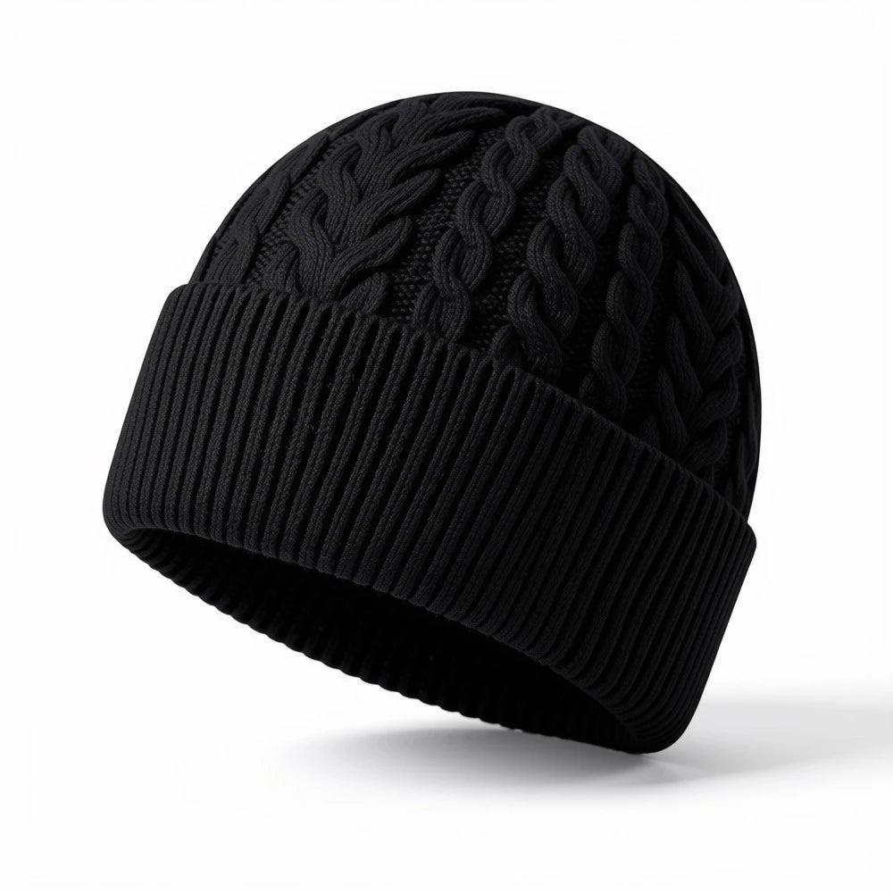Black cable knit beanie with ribbed cuff and classic textured pattern.