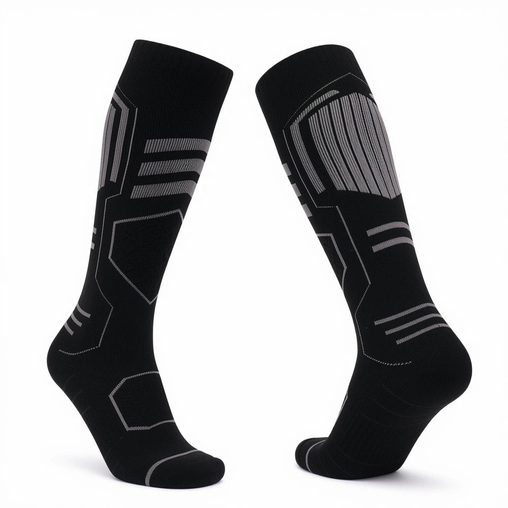 Black Merino blend ski socks showing the front and back in a V-shape.