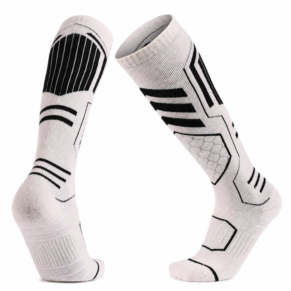 White Merino blend ski socks showing the front and back in a V-shape.
