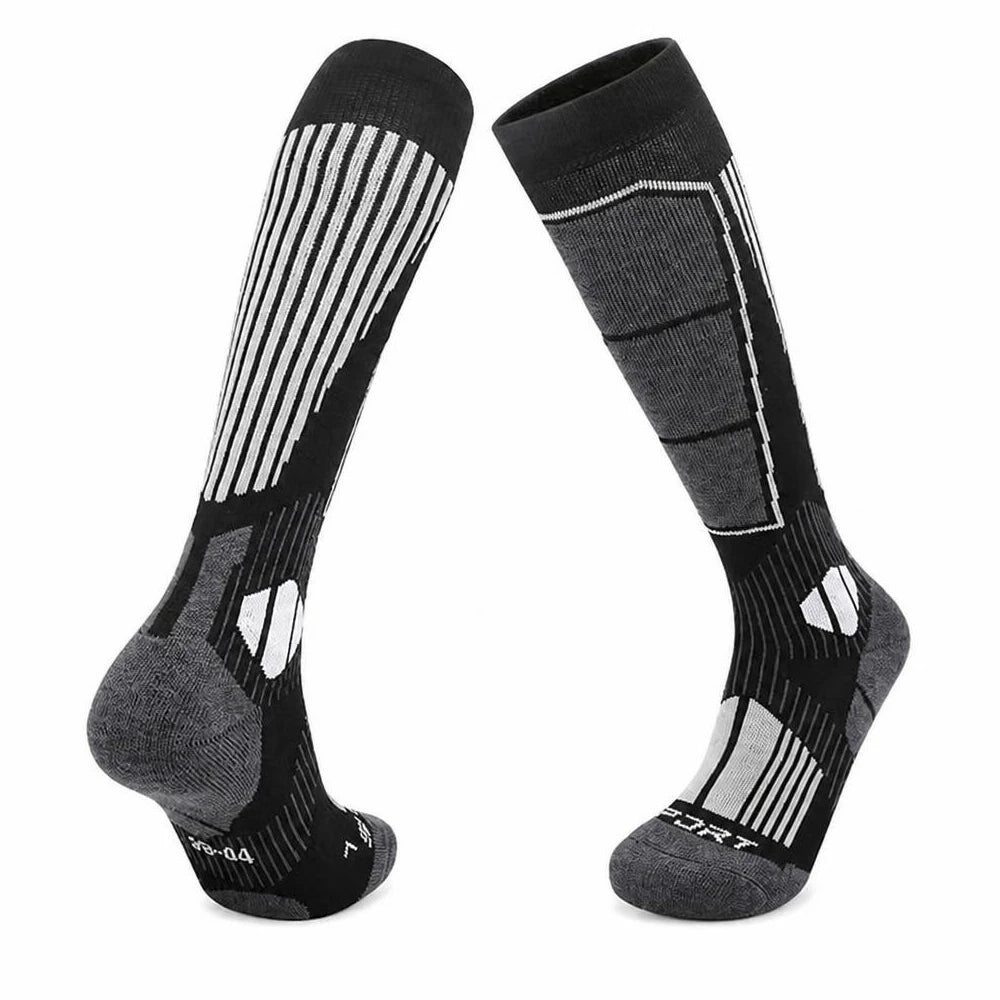 Black and grey merino wool ski socks with ribbed cuff and cushioned sole.