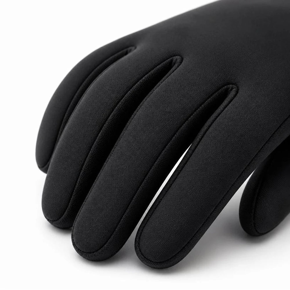 Close-up of the smooth matte back and pre-curved finger design on black winter cycling gloves.